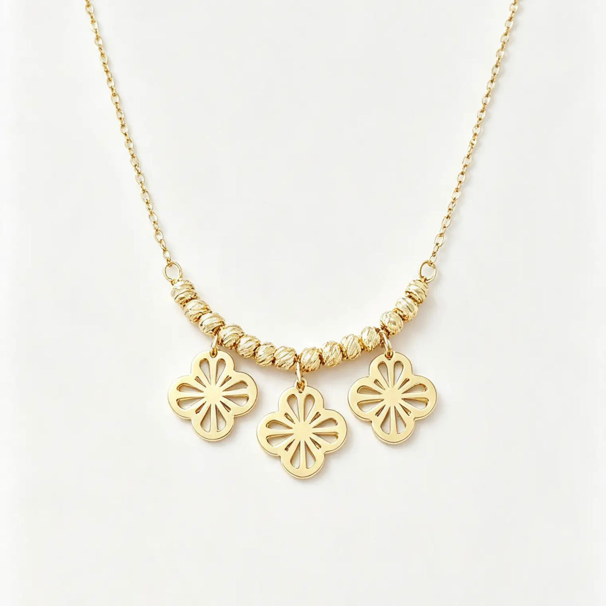 Collier triple tréfle or 18k