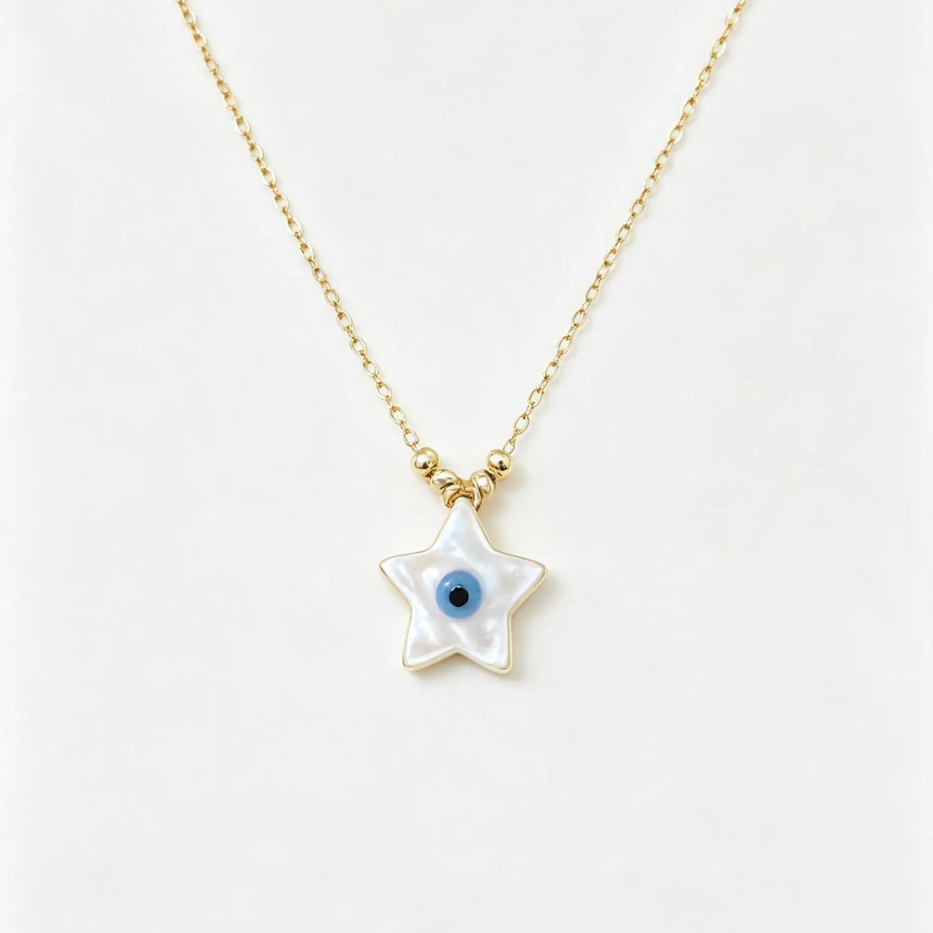 Collier Étoile Nacre & Œil en Or 18K